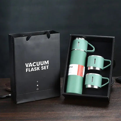 Modern black stainless steel insulated water bottle gift set with mint green vacuum insulated water flask and matching mugs