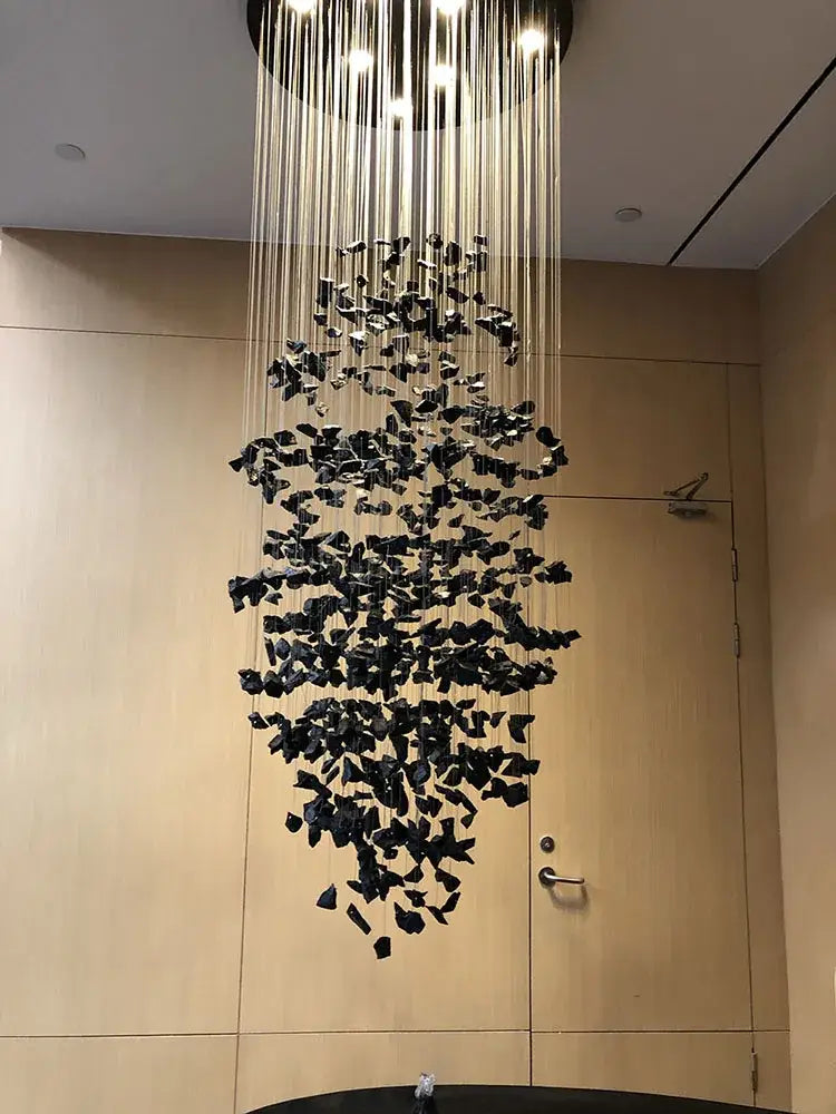 Modern black decorbites crystal chandelier with shard-like design for staircase lighting in living space décor