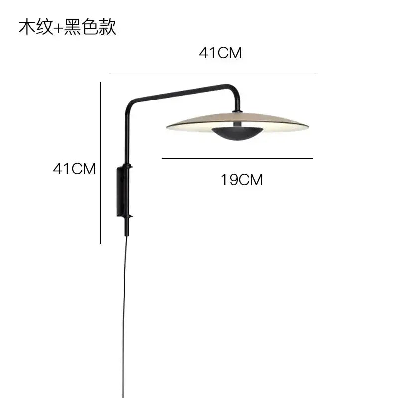 Modern black swing arm wall lamp with curved iron arm and circular wood-textured shade by decorbites iron art