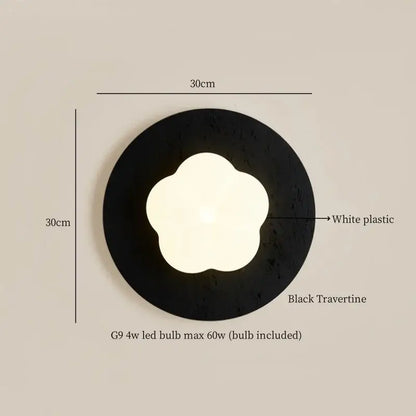 Modern black travertine flower led wall light featuring a circular black travertine sconce with white flower fixture by decorbites