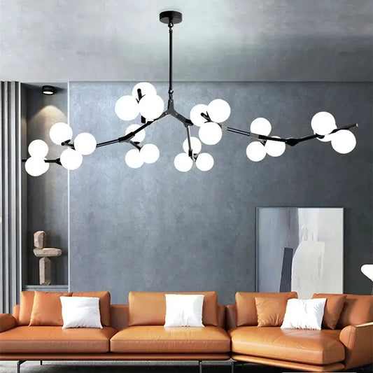 Modern black metal tree branch led ceiling light with spherical white glass globes for dining room illumination