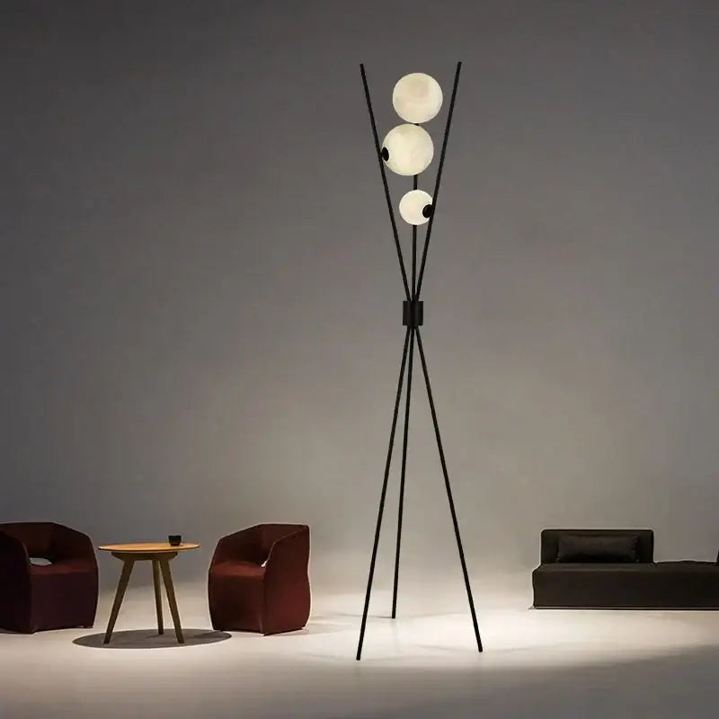 Modern black tripod moon floor lamp with three frosted white spherical bulbs perfect for living room decorbites moon floor