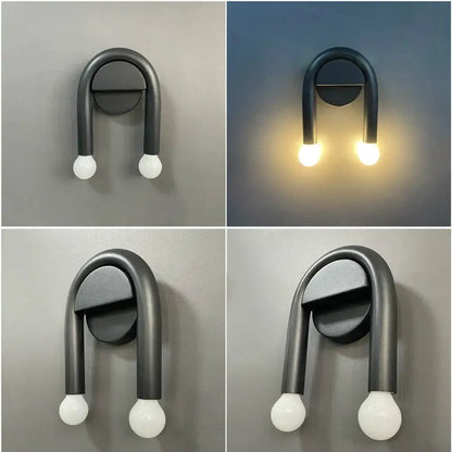 Modern black u-shaped led wall lamp with two white spherical bulbs ideal as a decorbites led wall lamp for bedroom