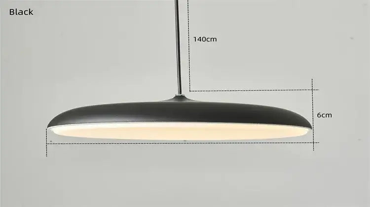 Modern black pendant light with sleek ufo design and 140cm hanging length ideal as a dining room light source