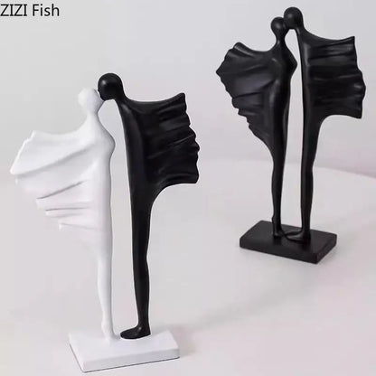 Modern black and white abstract lovers resin sculpture depicting two stylized figures in an intimate living room decorbites decorbites abstract lovers