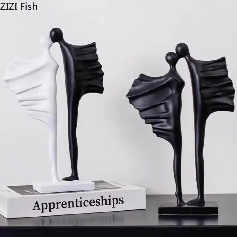 Modern black and white abstract lovers resin sculpture with flowing drapery forms for living room decorbites abstract lovers