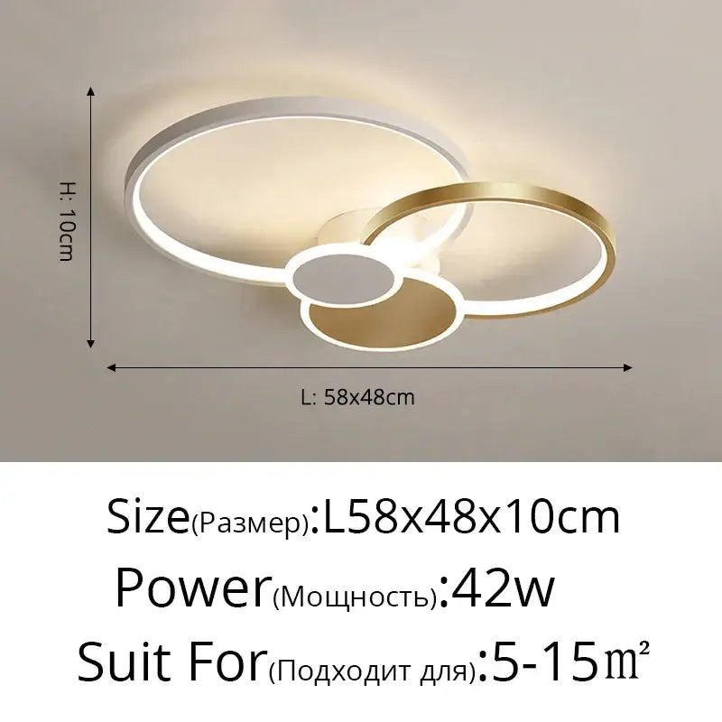 Modern black and white acrylic chandelier light with minimalist interlocking white and gold rings for living room