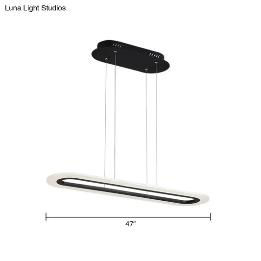 Modern black and white acrylic oblong light fixture with minimalist design and remote control for kitchen island lighting
