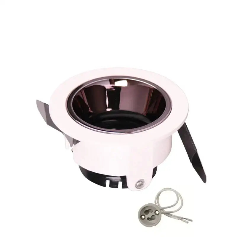 White recessed ceiling downlight with reflective black interior and adjustable flanges compatible with gu10 mr16 bulbs