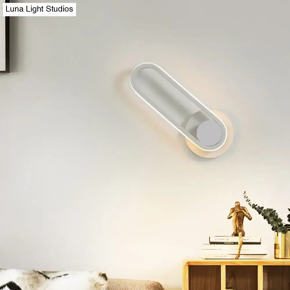 Modern black and white aluminum frame wall lamp with frosted glass and warm white light for bedroom sconce lighting