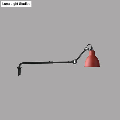 Modern black and white articulated bedroom wall lamp with red enamel lampshade mounted on direct wired electric arm