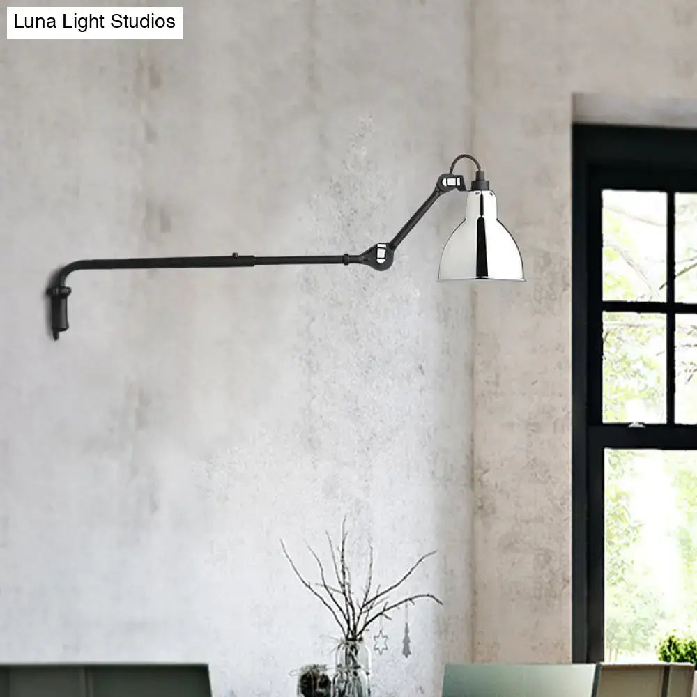 Modern black articulated wall lamp with white bell-shaped shade wired for direct wired electric power source