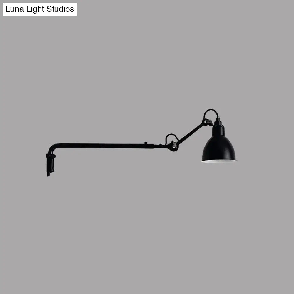 Modern black industrial-style articulated bedroom wall lamp with adjustable head and direct wired electric power source