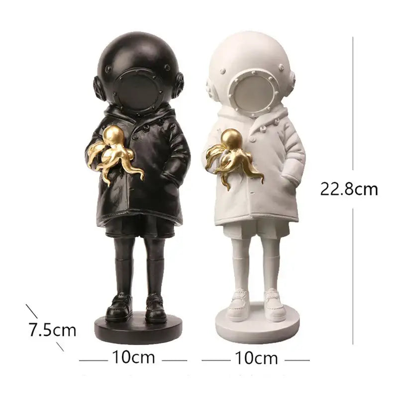 Modern black and white astronaut diver sculpture ornament holding golden octopus for office decor display