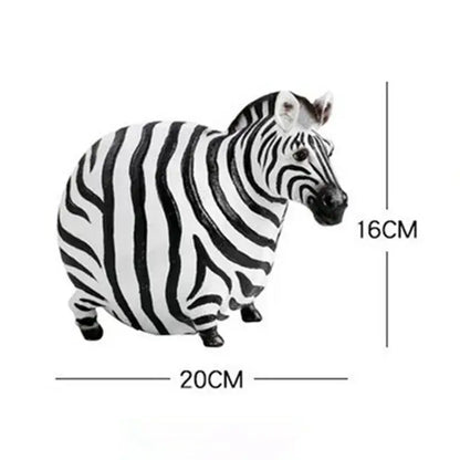 A modern black and white big belly zebra resin sculpture featuring a plush striped decorbites big belly design for living room decor