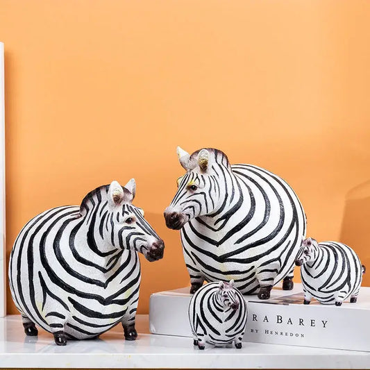 Set of four chubby black and white big belly zebra resin sculptures for modern living room decorbites decor