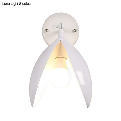 White ceramic wall light with sleek petal-like design for modern black and white blooming bud wall living room sconce