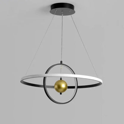 Modern black and white circular iron ball pendant light with two concentric rings and golden sphere for living room decorbites circular iron