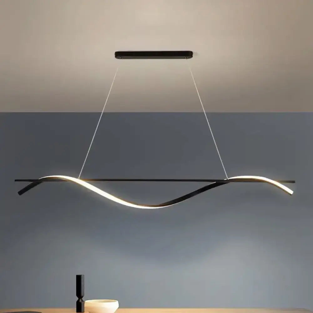 Modern black acrylic swirling island pendant light with sleek curved design and integrated led lighting by decorbites