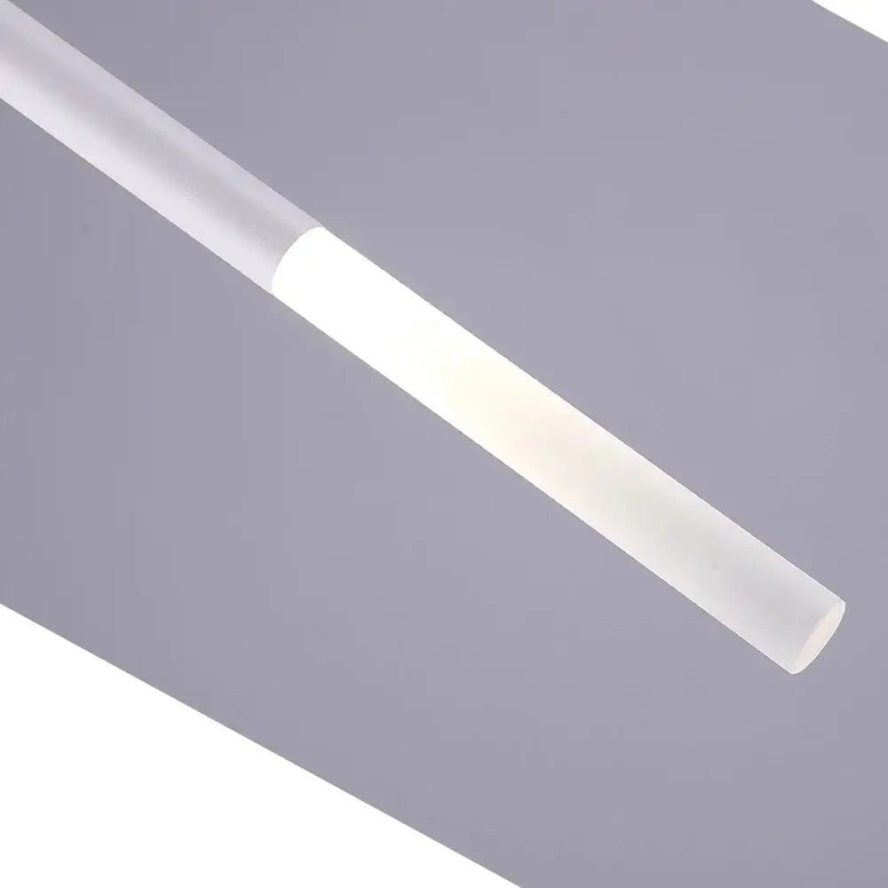 A sleek translucent white decorbites cylinder led pendant light with frosted finish for modern kitchen decor