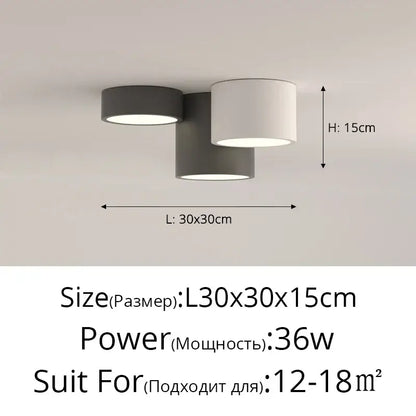 Modern black and white decorbites geometric chandelier with three matte gray and white cylindrical shades for bedrooms