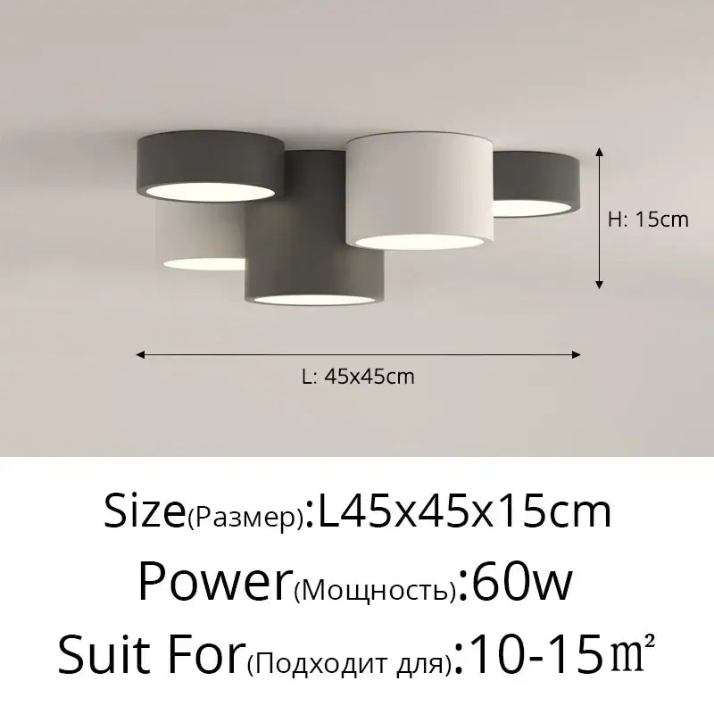 Modern black and white decorbites geometric chandelier with three matte gray and white cylindrical shades for bedroom lighting
