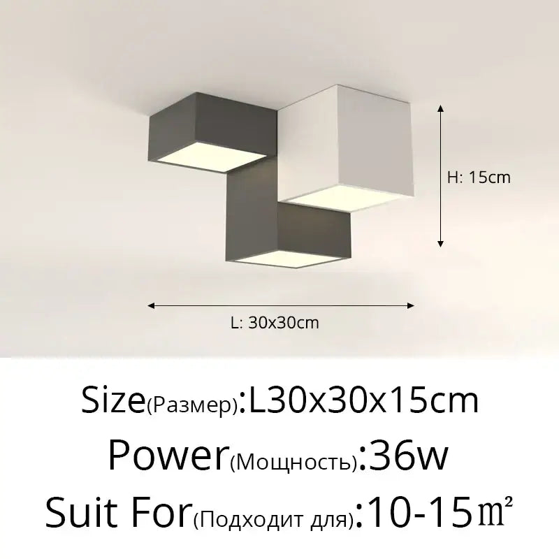 Modern black and white decorbites geometric chandelier featuring interlocking cube panels emitting warm light