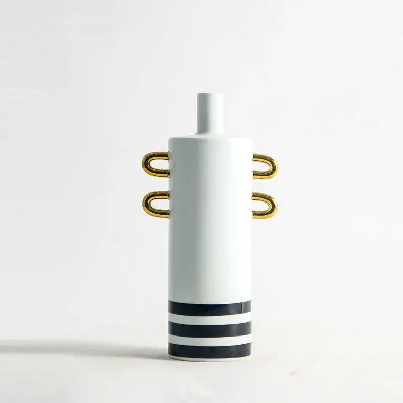 White ceramic vase with gold handles and black horizontal stripes for modern black and white dots geometric decor