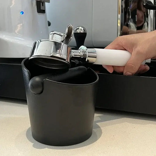 Modern black and white espresso knock box rubber portafilter holder with chrome accents for decorbites espresso knock use