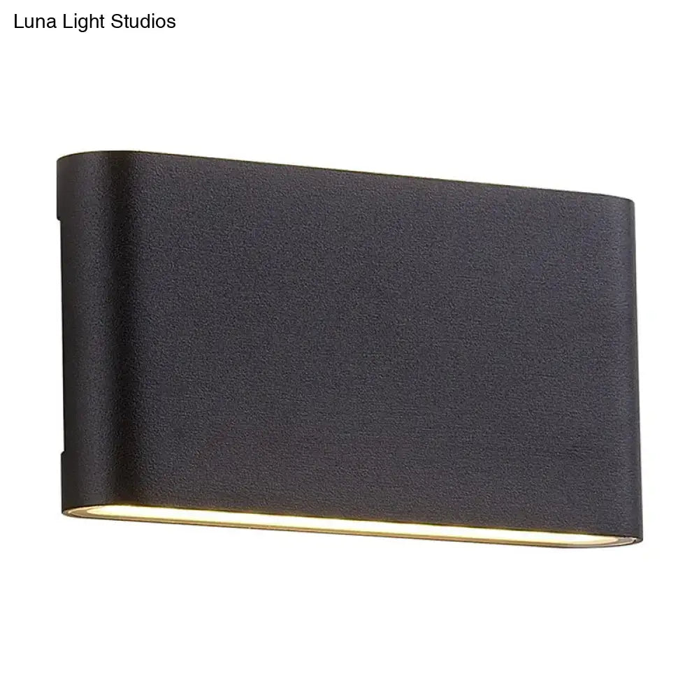 Modern black flush mount wall lamp with matte finish and warm LED light from bottom edge sconce light for bedroom
