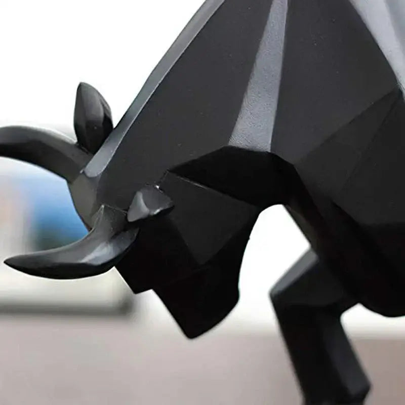 Modern black geometric bull sculpture with angular faceted design perfect for living room decorbites decor