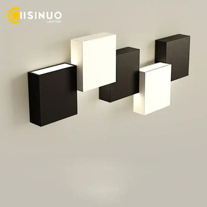 Modern black and white geometric led wall sconce with sleek minimalist design for living room decorbites geometric led wall