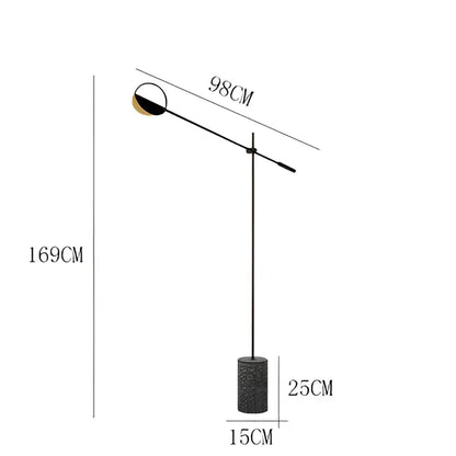 Modern black and gold floor lamp with a sleek cylindrical base and adjustable arm complements decorbites geometric line pendant lamp