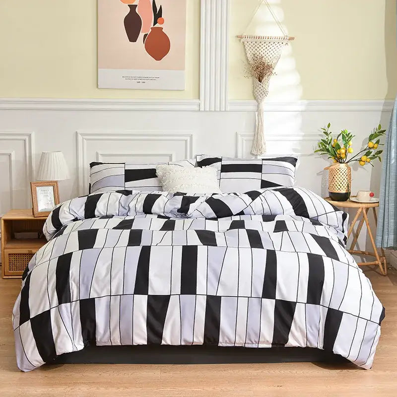 Modern black and white geometric stripes bedding set featuring a piano key pattern for stylish bedroom decorbites geometric stripes