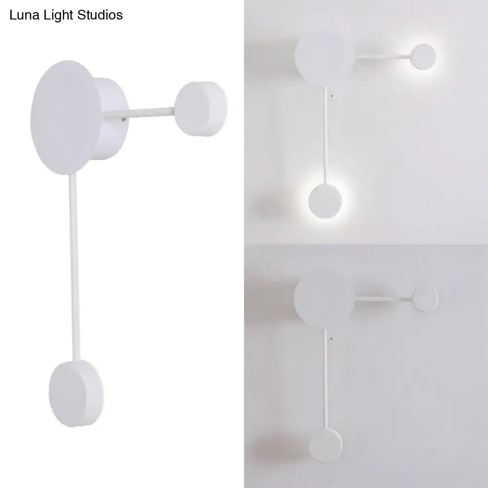 Minimalist white wall sconce with sleek geometric circular elements modern light fixture for living room wall light