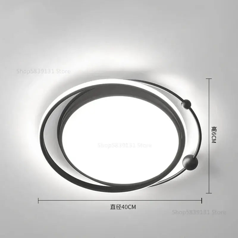 Modern black circular geometry led ceiling light with sleek metallic rings and spherical accents for decorbites geometry led ceiling