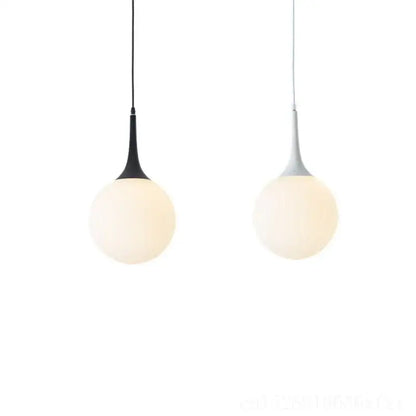 Modern black and white glass ball led pendant lights with spherical frosted glass globes for living room decorbites