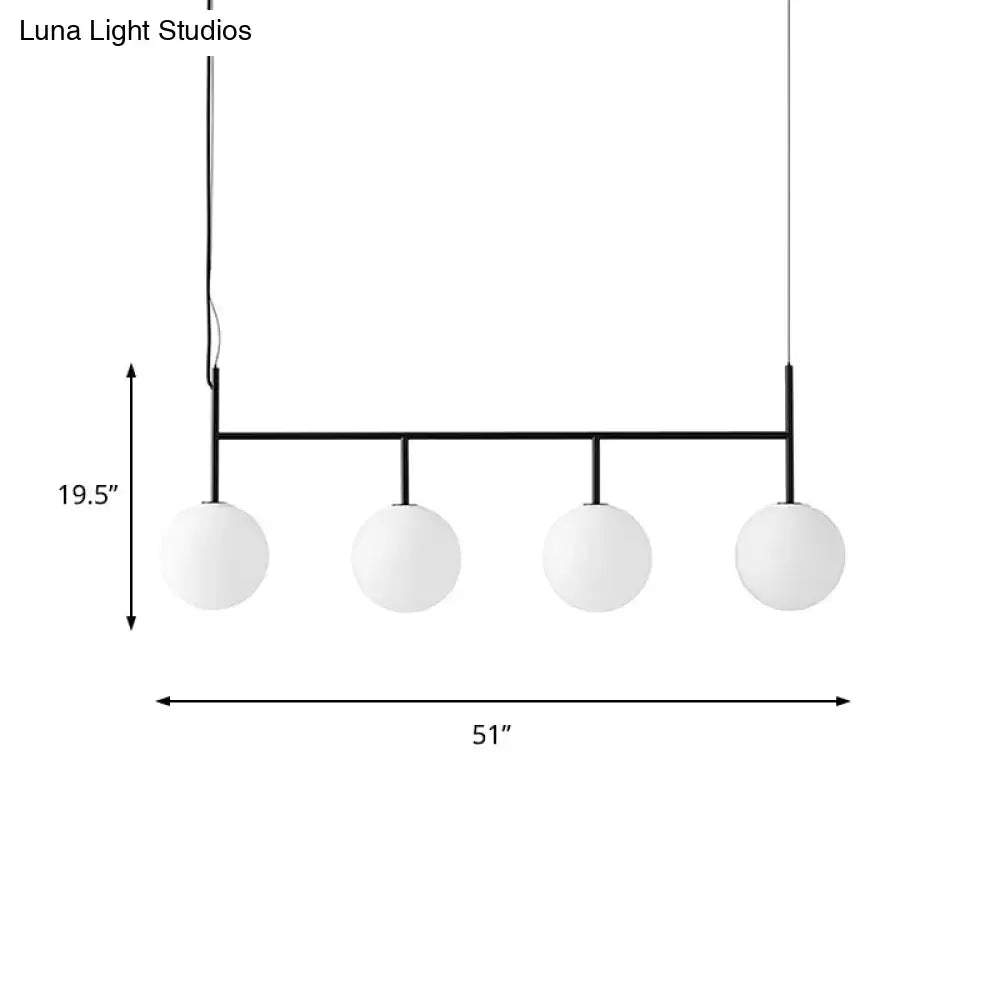 Decorbites contemporary black metal pendant light fixture with four white glass orb shades and four bulbs