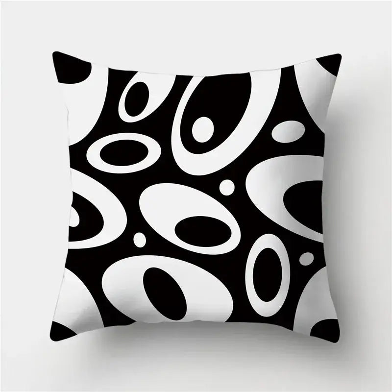 Modern black and white abstract oval patterned throw pillow featuring decorbites geometric stripes pillowcase design
