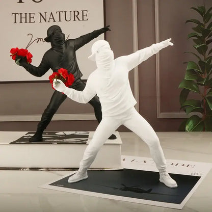 Modern black and white gorilla sculpture resin figurine holding red roses for living room decor by decorbites