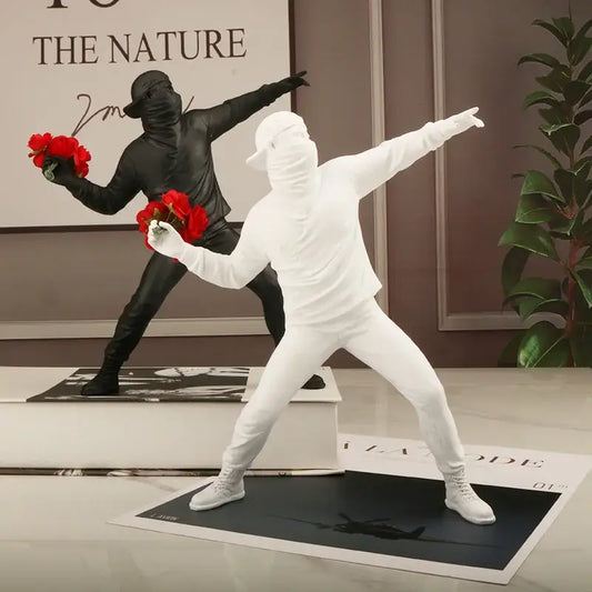 Modern black and white gorilla sculpture resin figurine holding red roses for living room decor by decorbites