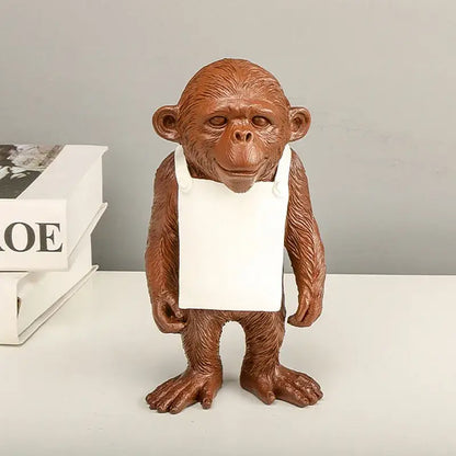 Brown resin monkey figurine wearing white apron as modern black and white gorilla sculpture resin decor bites living room decor