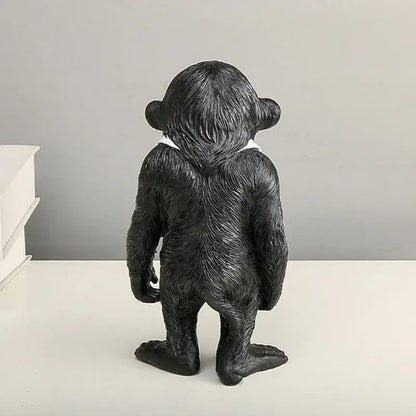 Modern black and white gorilla sculpture resin figurine with textured fur and white collar for living room decorbites decor