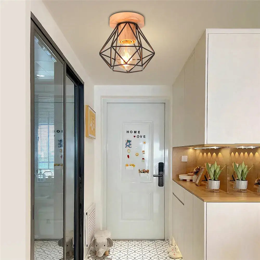 Modern black and white iron wood e27 ceiling light with geometric black metal cage and warm wooden disc by decorbites iron wood