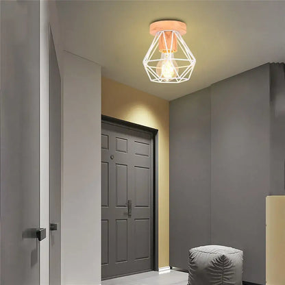 Modern black and white iron wood e27 ceiling light with warm-toned geometric wireframe and wooden base by decorbites iron wood