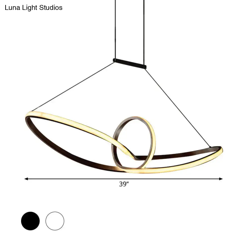 Modern DecorBites™ metal knotting island pendant with two interlocking rings in brushed gold and matte black