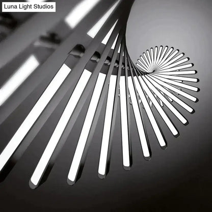 Decorbites modern led chandelier with sleek white rectangular bars radiates from central circular fixture in black and white