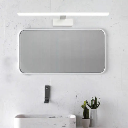 White rectangular bathroom mirror with a sleek minimalist frame paired with modern black white vanity lamp light