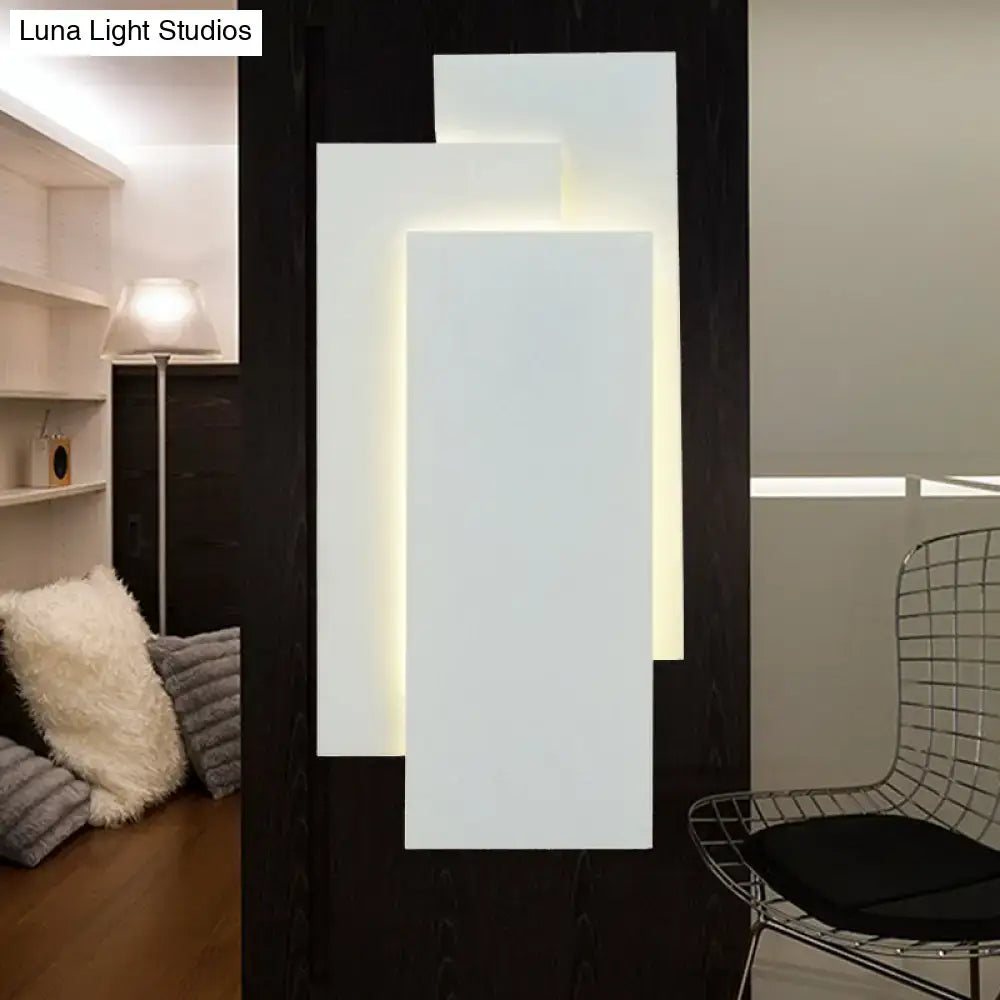 Modern black and white led wall lamp with layered illuminated panels and fixture height of 5in for bedroom use