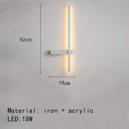 Modern black and white led wall lights feature a sleek white iron and acrylic minimalist sconce with warm vertical led strip